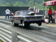 Purple NOVA Drag Car Popping Wheelie